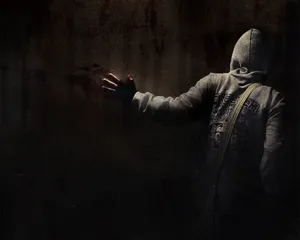 Mysterious Figure In The Shadows Wallpaper