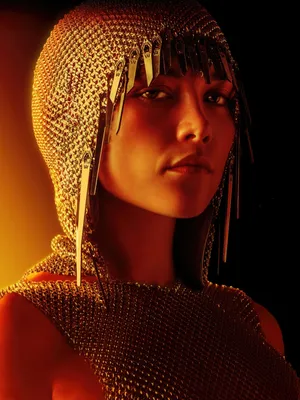 Mysterious Figurein Golden Chainmail Hood Wallpaper