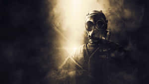 Mysterious_ Gas_ Mask_ Figure_in_ Smoke Wallpaper