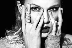 Mysterious Glance Blackand White Portrait Wallpaper