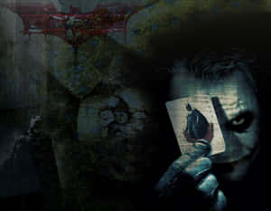 Mysterious Joker Card In Dark Aura Wallpaper