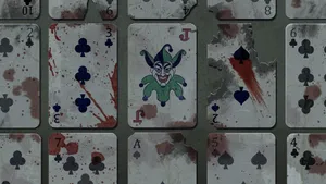 Mysterious Joker Playing Card In Vibrant Purple Hue Wallpaper