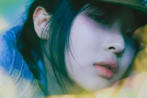 Mysterious Portrait Through Leaves Wallpaper