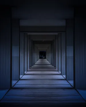 Mysterious Rays Of Light Filtering Into A Dark Room Wallpaper