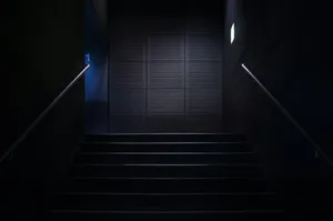 Mysterious_ Staircase_in_ Shadows.jpg Wallpaper