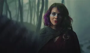 Mysterious Womanin Foggy Forest Wallpaper