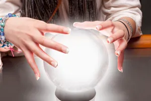 Mystical Crystal Ball On A Moody Dark Background Wallpaper