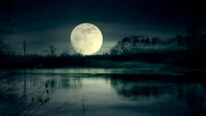 Mystical_ Moonrise_ Over_ Water Wallpaper