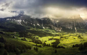 Mystical_ Mountain_ Valley_ Sunbeams Wallpaper