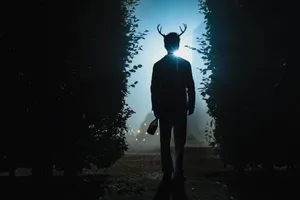 Mystical Stag Headed Figurein Foggy Park Wallpaper