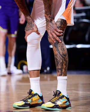N B A Player Tattooed Legs Courtside Wallpaper