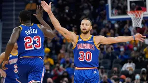 N B A Warriors Player Celebration Wallpaper