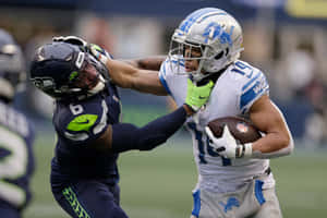 N F L Action Detroit Lionsvs Seattle Seahawks Wallpaper