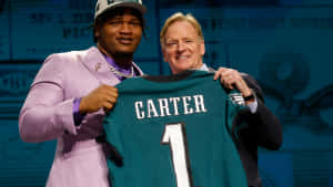 N F L Draft Pick Jalen Carter Jersey Presentation Wallpaper