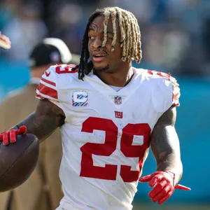 N F L Player Xavier Mc Kinney29 In Action Wallpaper