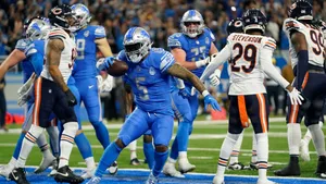 N F L Running Back Action Detroitvs Chicago Wallpaper