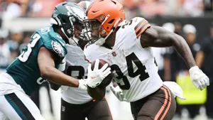 N F L Running Back Evasive Maneuver Wallpaper