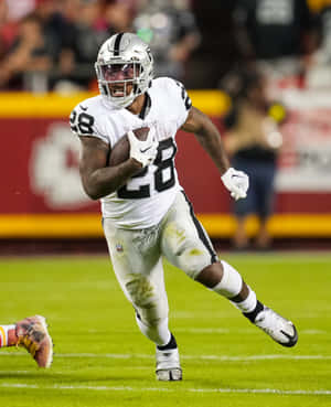 N F L Running Back In Action.jpg Wallpaper