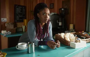 Naomi Ackiein Cafe Scene Wallpaper