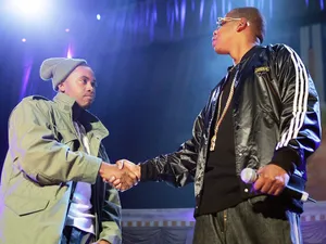 Nas And Jay Z On Stage Together Wallpaper