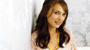 Natalie Portman With A Yellow Necklace Wallpaper