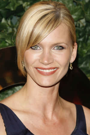 Natasha Henstridge Smiling Radiantly Wallpaper