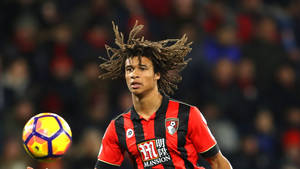 Nathan Ake Looking At Ball Wallpaper