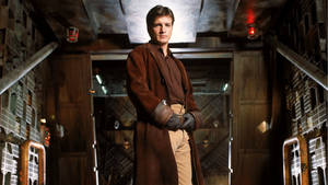 Nathan Fillion Gloves Pose Wallpaper