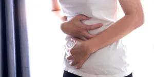 Nauseous Woman In White Body Wallpaper