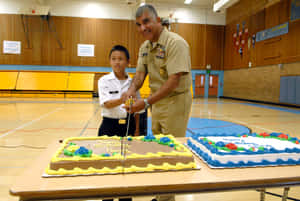 Navy Birthday Celebration Cake Cutting Wallpaper