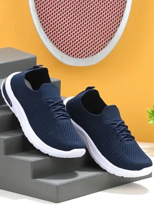 Navy Blue Sneakers Product Showcase Wallpaper