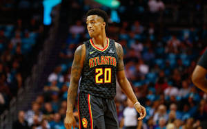 Nba Atlanta Hawks Player John Collins In Action Wallpaper