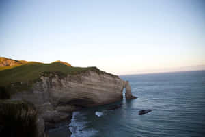 Nelson_ Coastal_ Cliffs_at_ Sunset Wallpaper