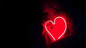 Neon Heart In Darkness Wallpaper