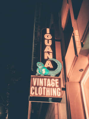 Neon Iguana Vintage Clothing Sign Wallpaper