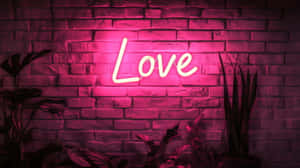 Neon Love Signon Brick Wall Wallpaper