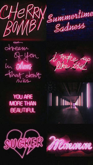 Neon Pink Lighting Illuminates A Night City. Wallpaper