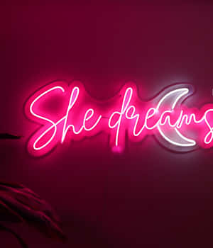 Neon She Dreams Sign Wallpaper