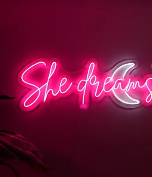 Neon She Dreams Sign Wallpaper