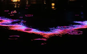 Neon Water Ripples Reflection Wallpaper