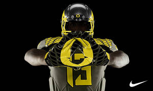 Neon Yellow College Football Player Wallpaper