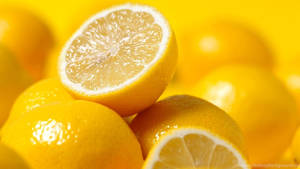 Neon Yellow Mouth-watering Lemon Wallpaper