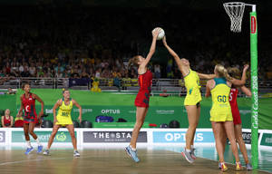 Netball Game Jump Shoot Ball Back Steal Wallpaper