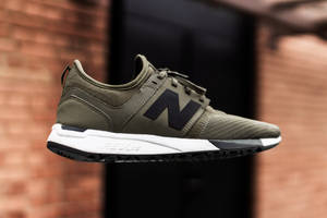 New Balance Floating Olive Green Shoe Wallpaper