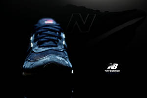 New Balance Shoe And Logo Wallpaper