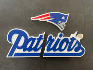 New_ England_ Patriots_ Logo_and_ Text Wallpaper