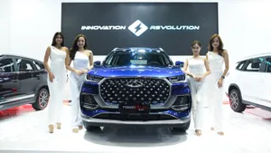 New Verve Of Power - Chery Tiggo 8 Suv In Idyllic Landscape Wallpaper