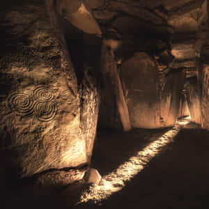 Newgrange Interior With Sunlight Passing Wallpaper