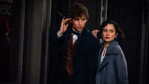 Newt_ Scamander_and_ Companion_ Prepared_for_ Action Wallpaper