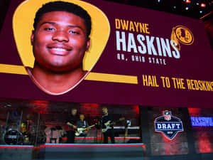 Nfl Quarterback Dwayne Haskins Takes The Field Wallpaper